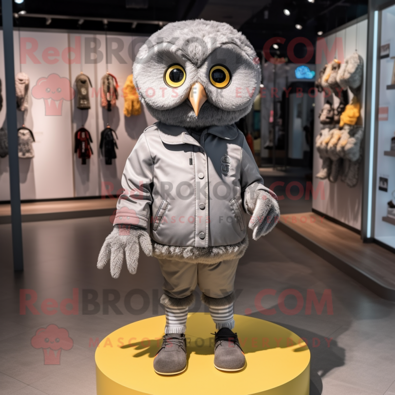 Gray Owl mascot costume character dressed with a Jacket and Shoe laces