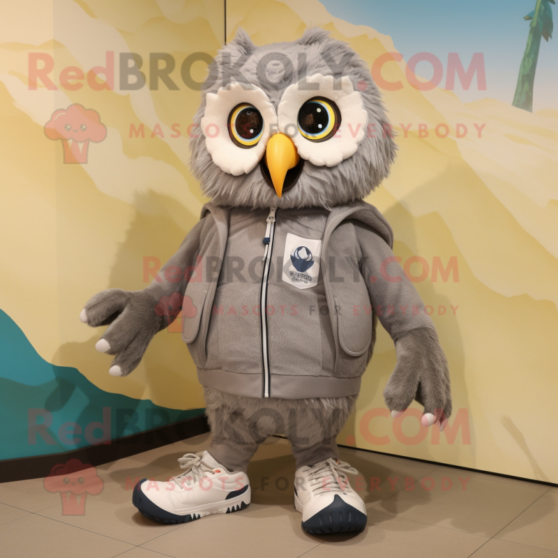 Gray Owl mascot costume character dressed with a Jacket and Shoe laces