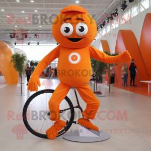 Orange Unicyclist mascot costume character dressed with a Running Shorts and Gloves