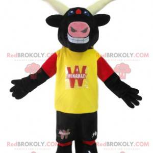 Bullenmaskottchen mit gelbem Trikot. Bullenkostüm -