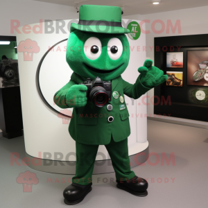 Forest Green Camera mascot costume character dressed with a Suit and Gloves