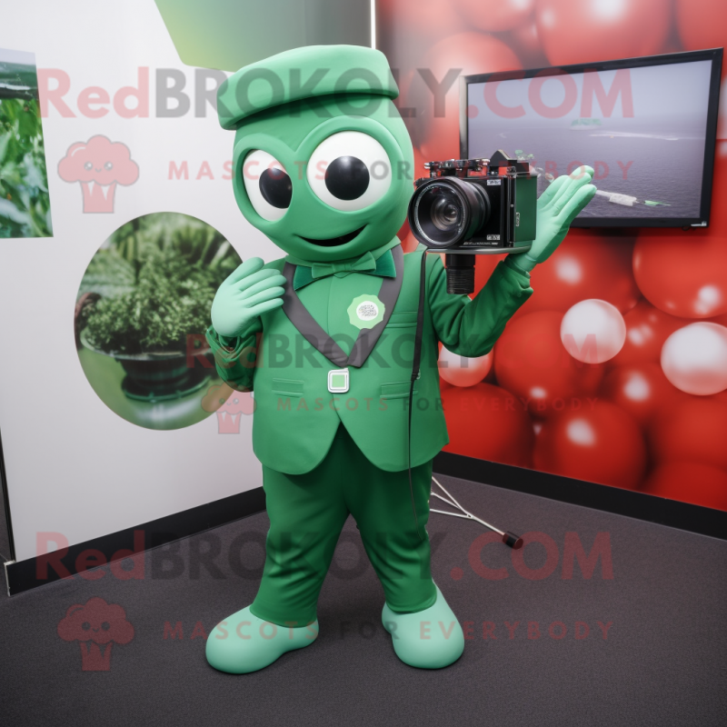 Forest Green Camera mascot costume character dressed with a Suit and Gloves