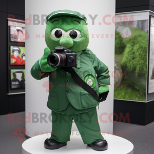 Forest Green Camera mascot costume character dressed with a Suit and Gloves