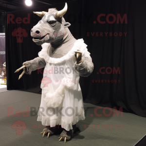 Gray Woolly Rhinoceros mascot costume character dressed with a Wedding Dress and Suspenders