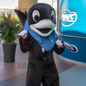 Rust Killer Whale mascot costume character dressed with a Flare Jeans and Scarves