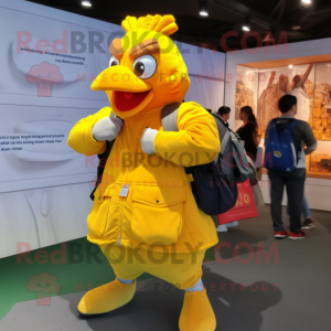 Yellow Butter Chicken mascot costume character dressed with a Jacket and Backpacks