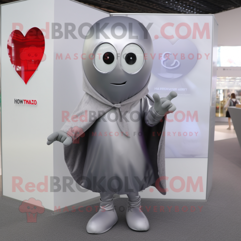 Silver Heart mascot costume character dressed with a Hoodie and Tie pins Silver Heart mascot costume character dressed with a Hoodie and Tie pins