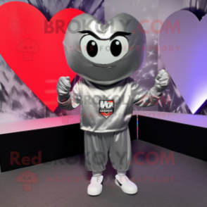 Silver Heart mascot costume character dressed with a Hoodie and Tie pins