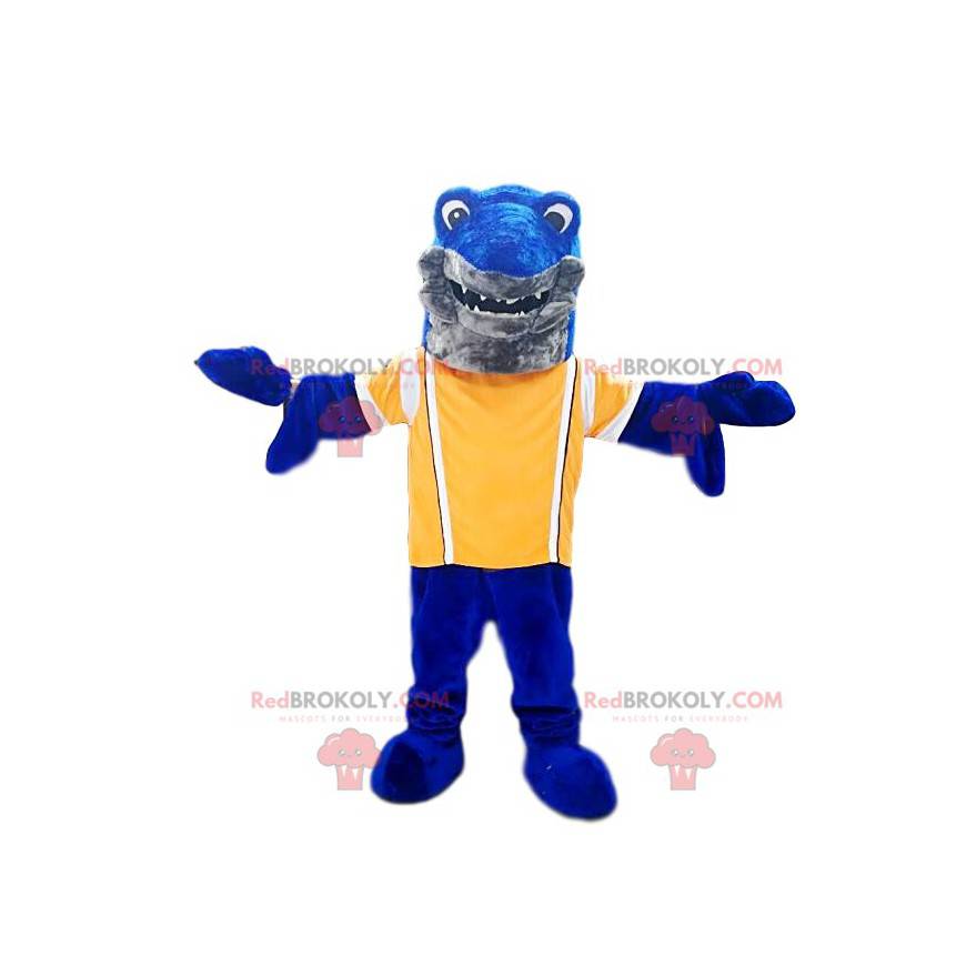 Mascot tiburón azul con una camiseta amarilla. Disfraz de