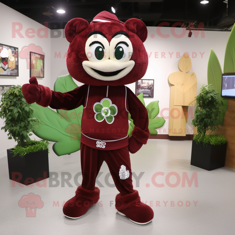 Maroon Four Leaf Clover mascot costume character dressed with a Joggers and Rings Maroon Four Leaf Clover mascot costume character dressed with a Joggers and Rings