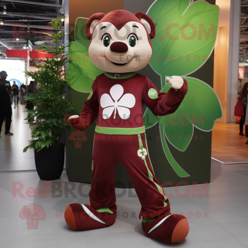 Maroon Four Leaf Clover mascot costume character dressed with a Joggers and Rings Maroon Four Leaf Clover mascot costume character dressed with a Joggers and Rings