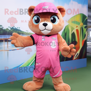 Pink Jaguarundi mascot costume character dressed with a Shorts and Headbands