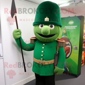 Green British Royal Guard mascot costume character dressed with a Cardigan and Keychains