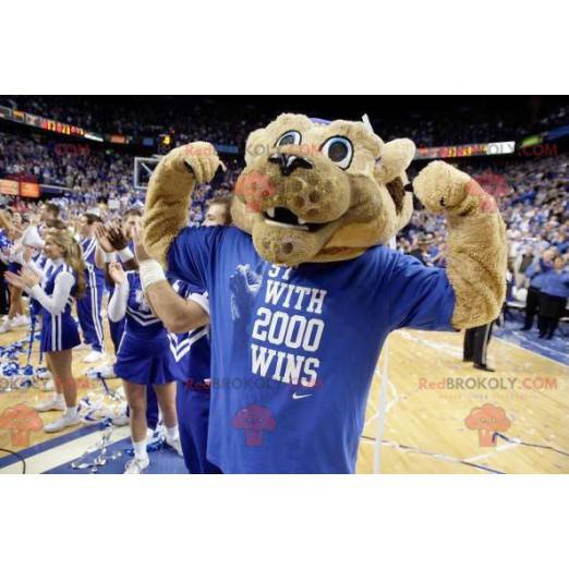 Beige tiger mascot in blue sportswear - Redbrokoly.com