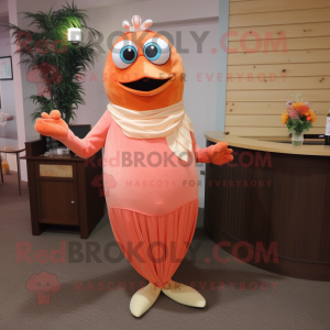 Peach Salmon mascot costume character dressed with a Cocktail Dress and Shawl pins