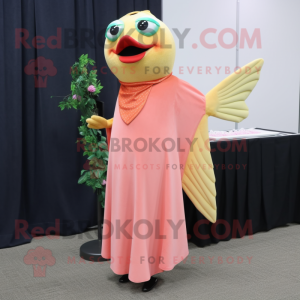 Peach Salmon mascot costume character dressed with a Cocktail Dress and Shawl pins