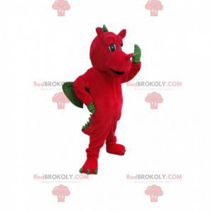Mascote do dragão vermelho com asas verdes. Fantasia de dragão