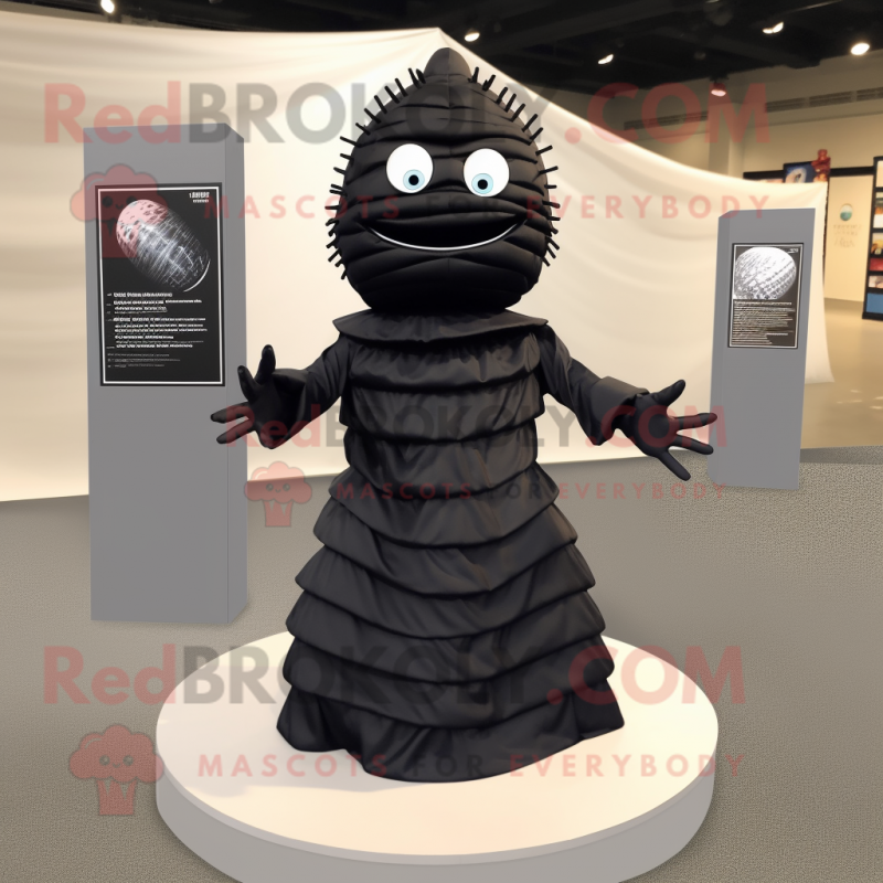 Black Trilobite mascot costume character dressed with a Dress and Bow ties