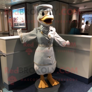 Silver Duck mascot costume character dressed with a A-Line Dress and Berets