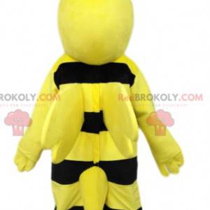 Bardzo uśmiechnięta czarna i żółta pszczoła maskotka. Kostium