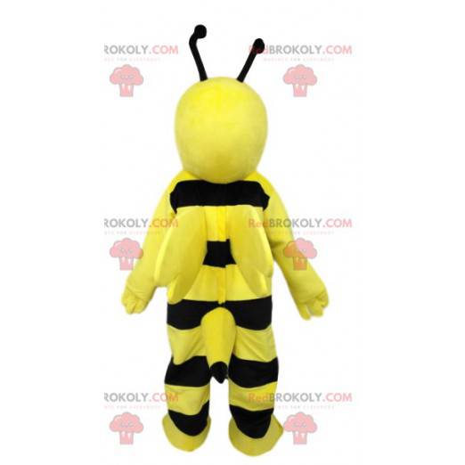 Mascotte d'abeille noir et jaune très souriante. Costume