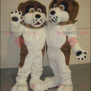 2 Maskottchen von braunen, schwarzen und weißen Hunden -