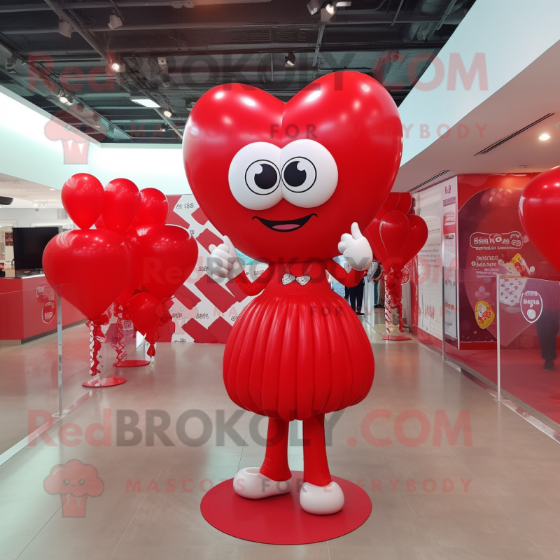 Red Heart Shaped Balloons mascot costume character dressed with a Mini Dress and Bracelets Red Heart Shaped Balloons mascot costume character dressed with a Mini Dress and Bracelets