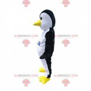 Mascotte del pinguino in bianco e nero con un becco giallo -