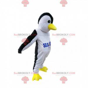 Mascote pinguim preto e branco com bico amarelo - Redbrokoly.com