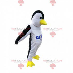 Mascotte de pingouin noir et blanc avec un bec jaune -