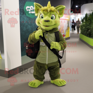 Green Chupacabra mascot costume character dressed with a Parka and Messenger bags