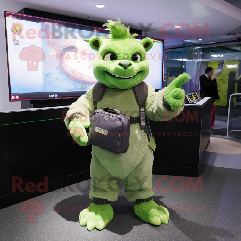 Green Chupacabra mascot costume character dressed with a Parka and Messenger bags Green Chupacabra mascot costume character dressed with a Parka and Messenger bags