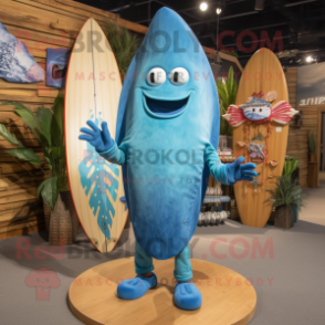Turquoise Surfboard mascot costume character dressed with a Denim Shirt and Shawl pins