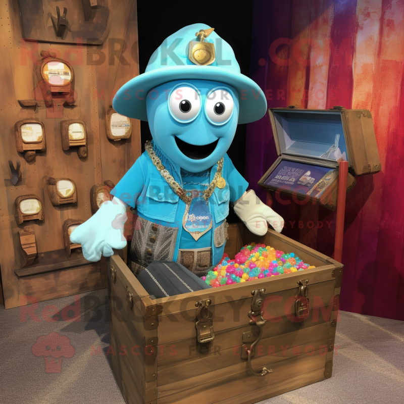 Turquoise Treasure Chest mascot costume character dressed with a Chambray Shirt and Brooches Turquoise Treasure Chest mascot costume character dressed with a Chambray Shirt and Brooches