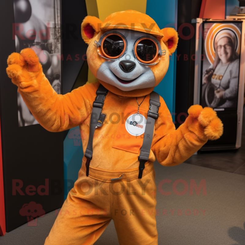 Orange Lemur mascot costume character dressed with a Dungarees and Bracelets Orange Lemur mascot costume character dressed with a Dungarees and Bracelets