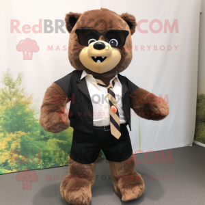 Brown Spectacled Bear mascot costume character dressed with a Trousers and Earrings