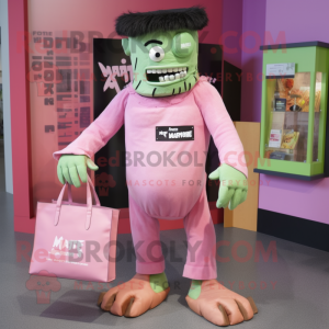Pink Frankenstein mascot costume character dressed with a Romper and Tote bags