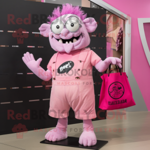 Pink Frankenstein mascot costume character dressed with a Romper and Tote bags