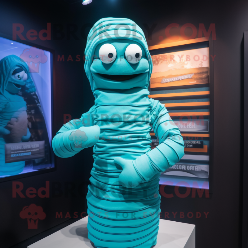 Cyan Mummy mascot costume character dressed with a Jacket and Scarves