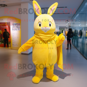 Yellow Rabbit mascot costume character dressed with a Boyfriend Jeans and Shawl pins