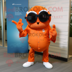 Orange Crab Cakes mascot costume character dressed with a Flare Jeans and Sunglasses