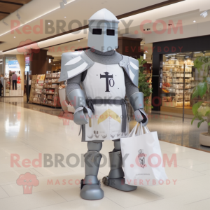 Gray Medieval Knight mascot costume character dressed with a Bodysuit and Tote bags