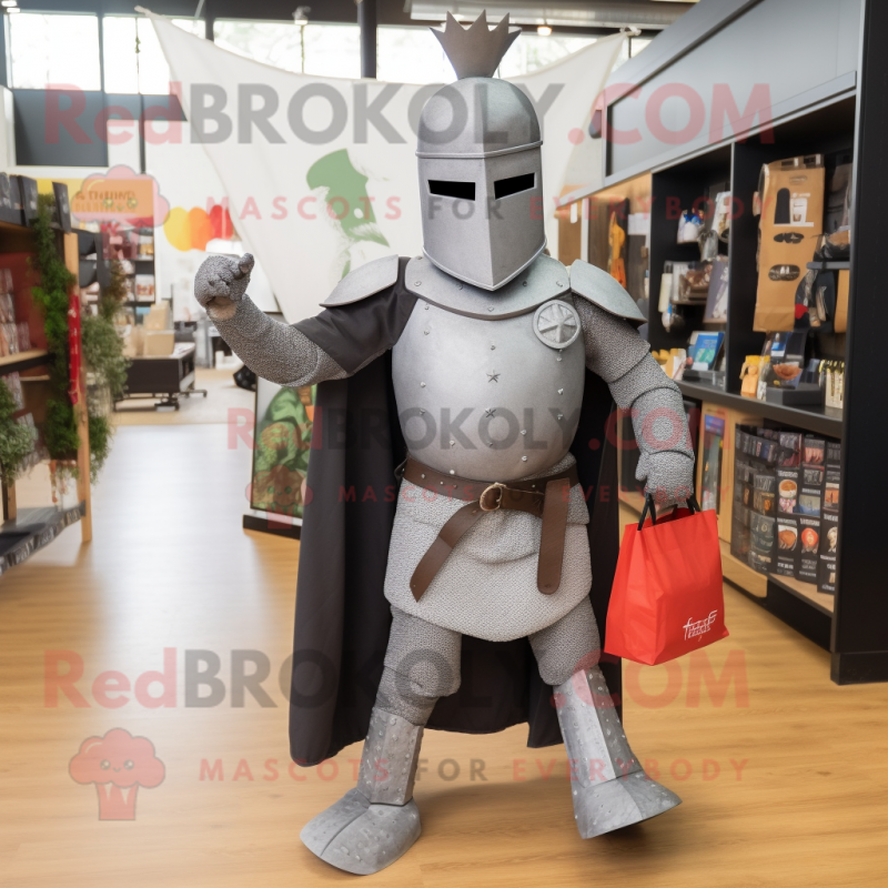 Gray Medieval Knight mascot costume character dressed with a Bodysuit and Tote bags