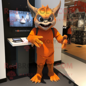 Orange Gargoyle mascot costume character dressed with a Playsuit and Keychains