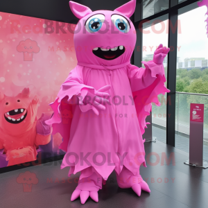 Pink Demon mascot costume character dressed with a Raincoat and Brooches