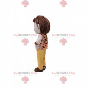 Mascota de niño con un traje de estilo prehistórico. -