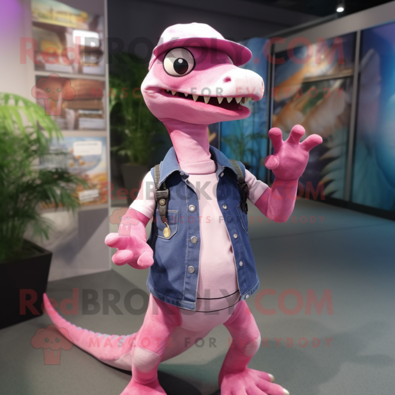 Pink Coelophysis mascot costume character dressed with a Jeans and Caps Pink Coelophysis mascot costume character dressed with a Jeans and Caps