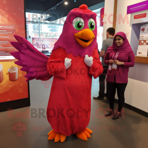 Magenta Butter Chicken mascot costume character dressed with a Wrap Dress and Tie pins