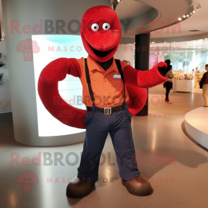 Red Titanoboa mascot costume character dressed with a Flare Jeans and Suspenders