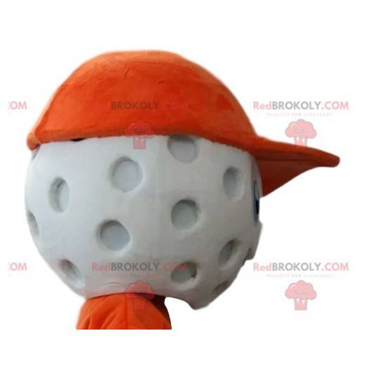 Piłka golfowa maskotka głowa z pomarańczową czapką. -